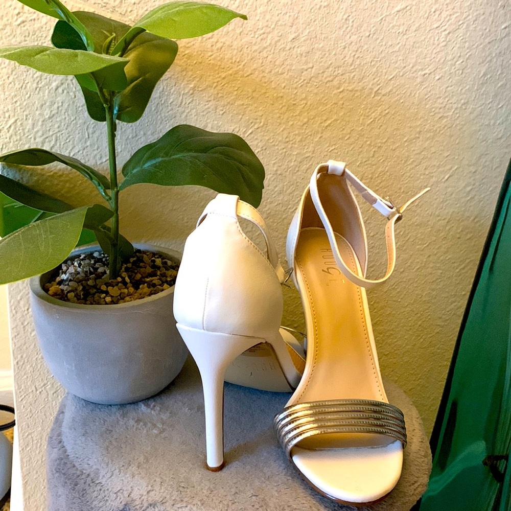 White 4 “ Stilettos with sliver crossing aNew New, never been worn.
